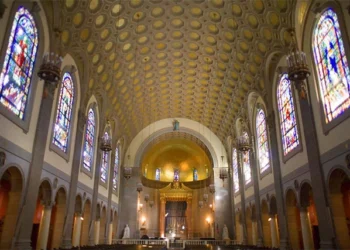 Inside of a church with stain glass windows